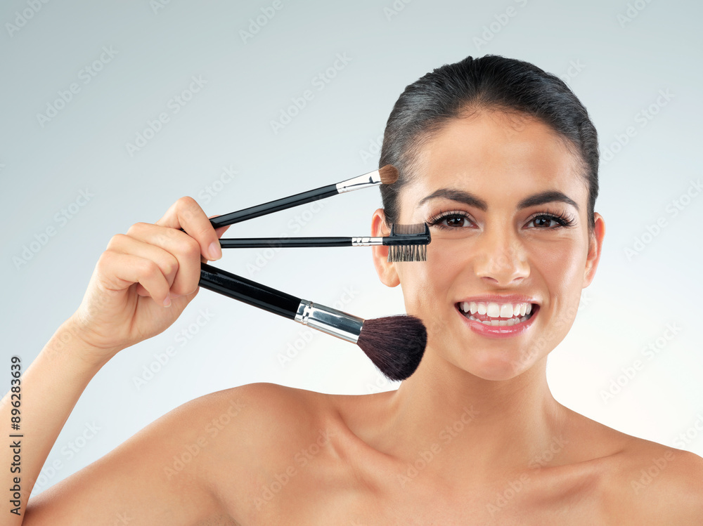 Portrait, makeup and woman with brushes, beauty and cosmetics on gray studio background. Face, person and model with tools, grooming routine and aesthetic with dermatology, glow and shine with luxury Portrait, makeup and woman with brushes, beauty and cosmetics on gray studio background. Face, person and model with tools, grooming routine and aesthetic with dermatology, glow and shine with luxury