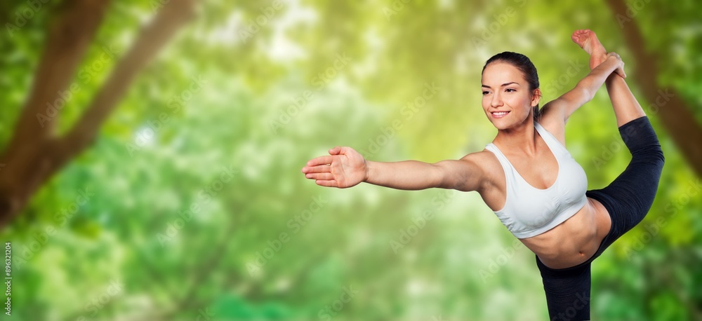 Young woman stretching body, doing yoga. Young woman stretching body, doing yoga.