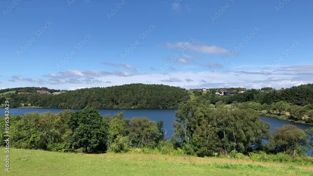 landscape with lake and tree covered mountains landscape with lake and tree covered mountains