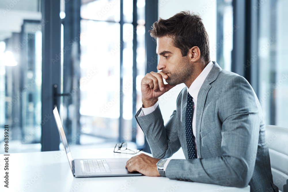 © Chanelle2000/peopleimages.com - Decision, laptop and review with business man at desk in office for planning or problem solving. Computer, feedback and thinking with professional employee reading email proposal for investment © Chanelle2000/peopleimages.com - Decision, laptop and review with business man at desk in office for planning or problem solving. Computer, feedback and thinking with professional employee reading email proposal for investment
