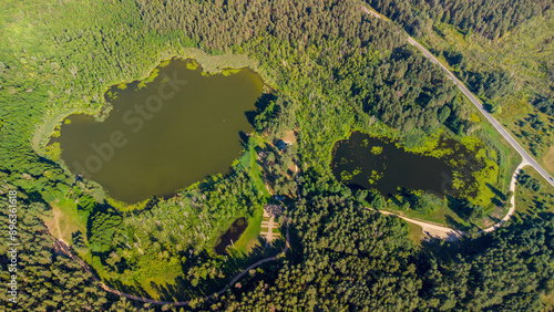 Aerial view of a lake in the forests of Lithuania, wild nature. The name of the lake is 