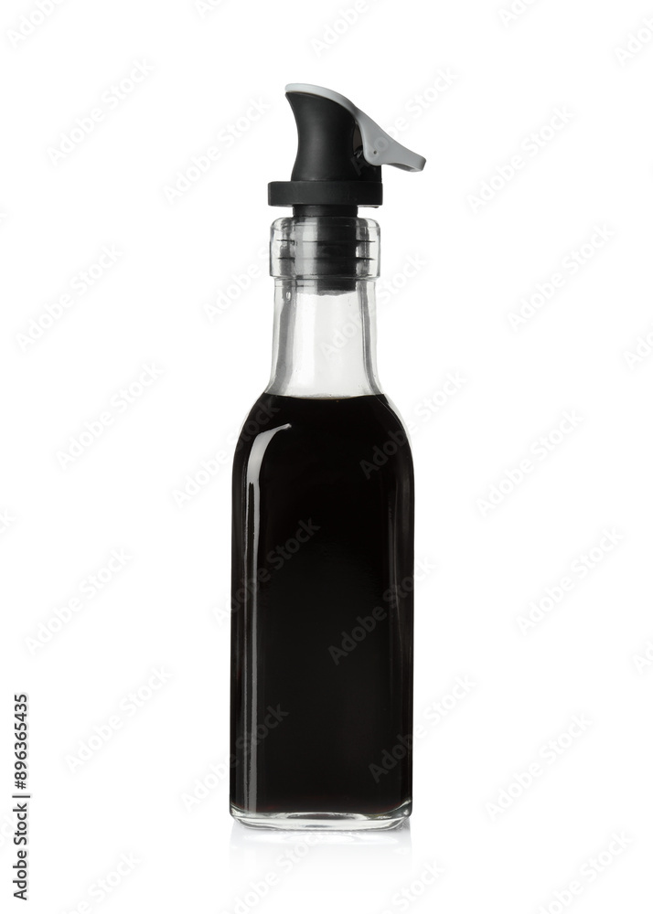 Balsamic vinegar in bottle isolated on white Balsamic vinegar in bottle isolated on white