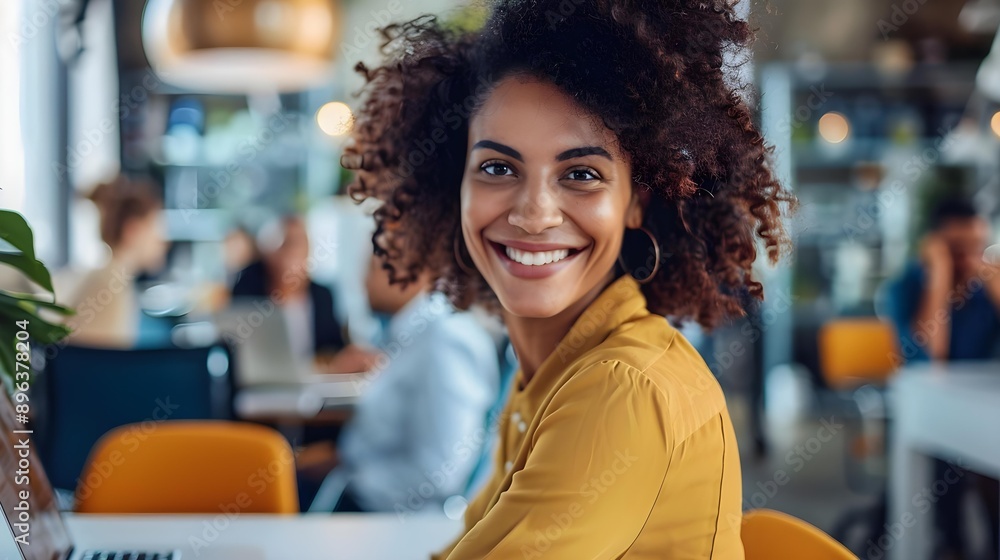 Smiling businesswoman and coworker working together Smiling businesswoman and coworker working together
