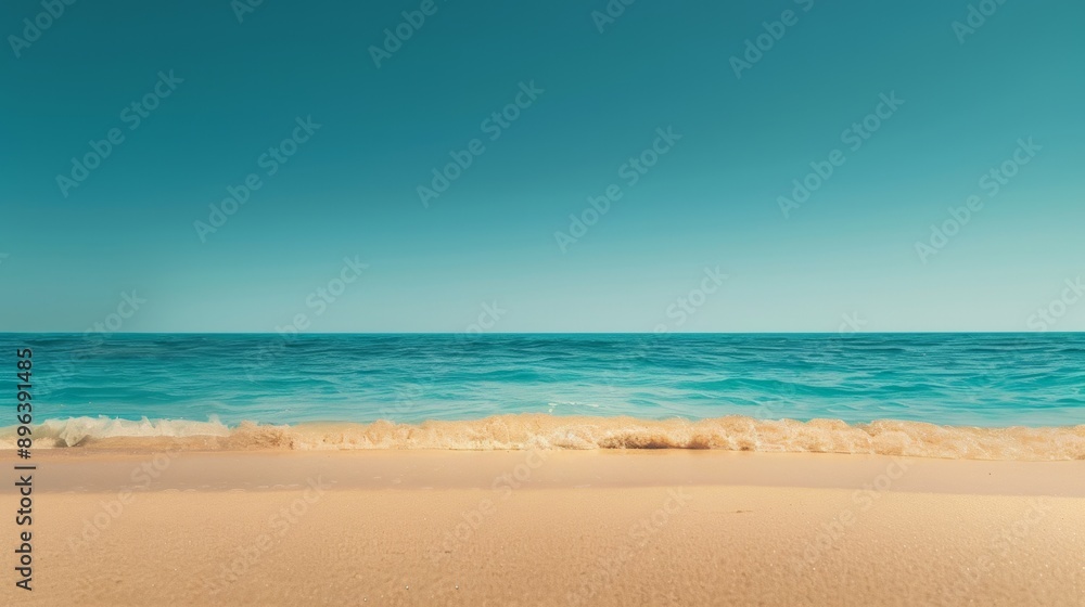 Turquoise blue water meets the golden sand of a pristine beach with a clear sky above, offering a serene and inviting summer vacation vibe Turquoise blue water meets the golden sand of a pristine beach with a clear sky above, offering a serene and inviting summer vacation vibe