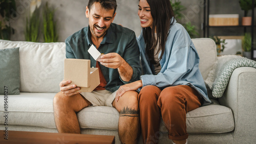 Boyfriend read greeting card thank you note from his girlfriend © Miljan Živković