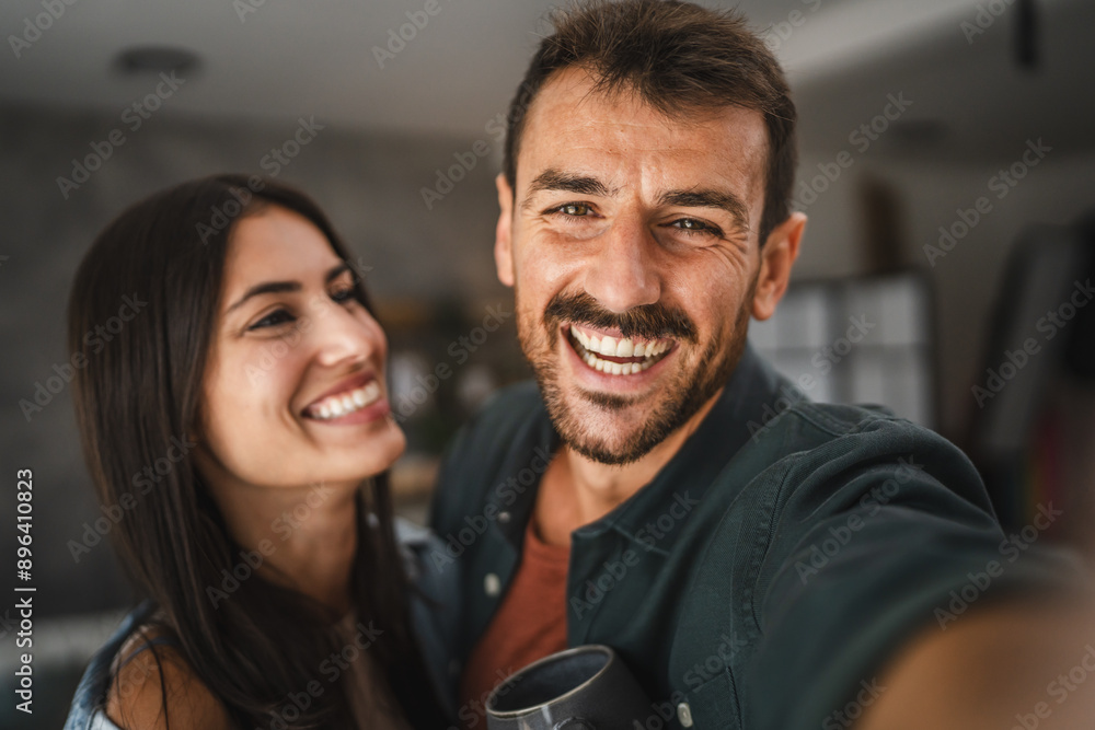 Self portrait of happy couple hug and have fun at home Self portrait of happy couple hug and have fun at home