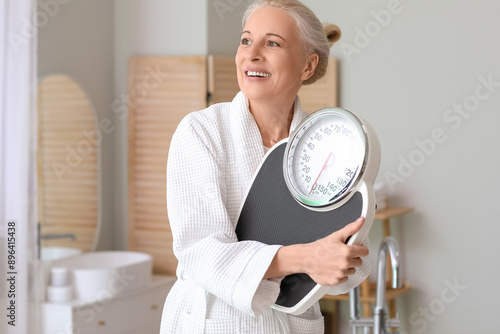 Mature woman with scales in...