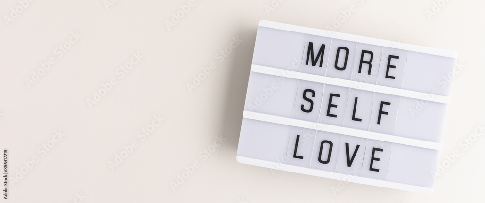 More self love. Banner with lightbox on a gray background. Place for text. More self love. Banner with lightbox on a gray background. Place for text.