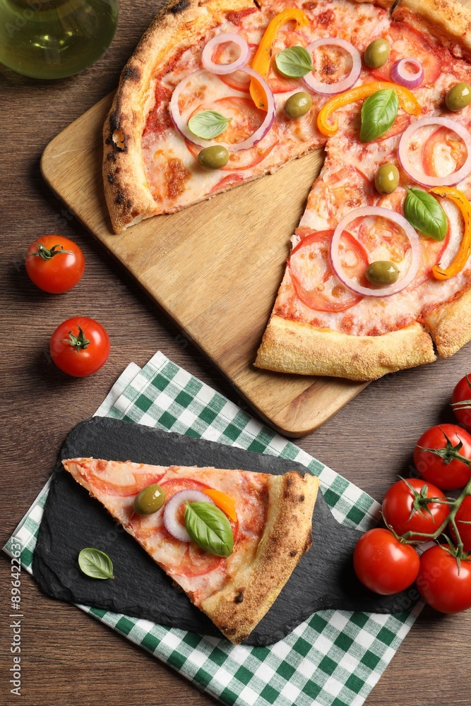 Delicious vegetarian pizza served on wooden table, flat lay Delicious vegetarian pizza served on wooden table, flat lay