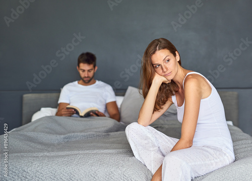 Argue, fighting and ignore with couple in bedroom of home for conflict, issue or marriage problems. Angry, erectile dysfunction or libido with man and woman on bed in apartment for relationship drama
