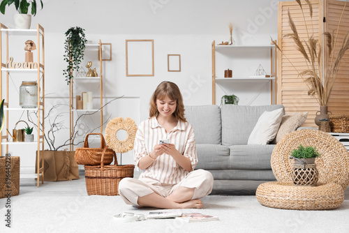 Young woman using smartphon...
