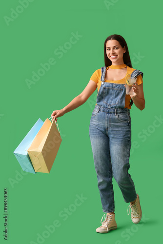 Young happy woman with cup ...