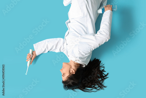 Happy young female dentist ...