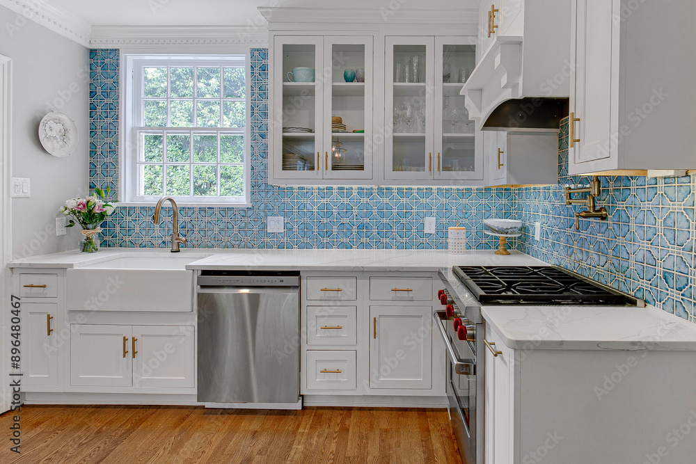 Beautiful Kitchen With Blue Tile Backsplash And Stainless Steel Appliances