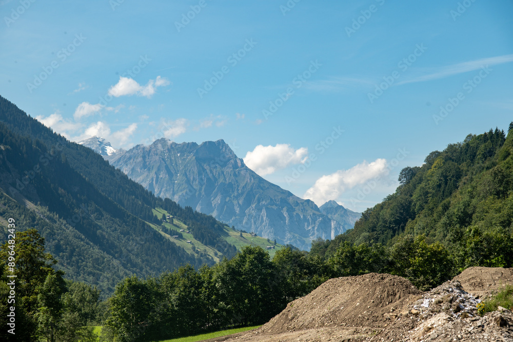 Switzerland Swiss Alps. Alpine pasture in mountains. Lake in the Swiss Alps. Panoramic view. Switzerland Landscape with mountains. Switzerland Swiss Alps. Alpine pasture in mountains. Lake in the Swiss Alps. Panoramic view. Switzerland Landscape with mountains.