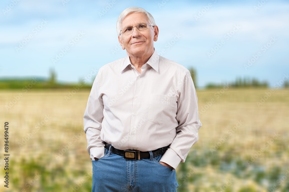 Portrait of a happy senior man posing outdoors Portrait of a happy senior man posing outdoors