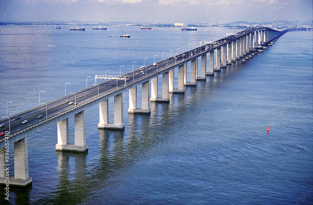 Obraz premium Rio-Niteroi Bridge is a box girder bridge crossing Guanabara Bay, in the State of Rio de Janeiro. It connects the citIES of Rio de Janeiro and Niterói., with total length: 13,2 Km. Brazil