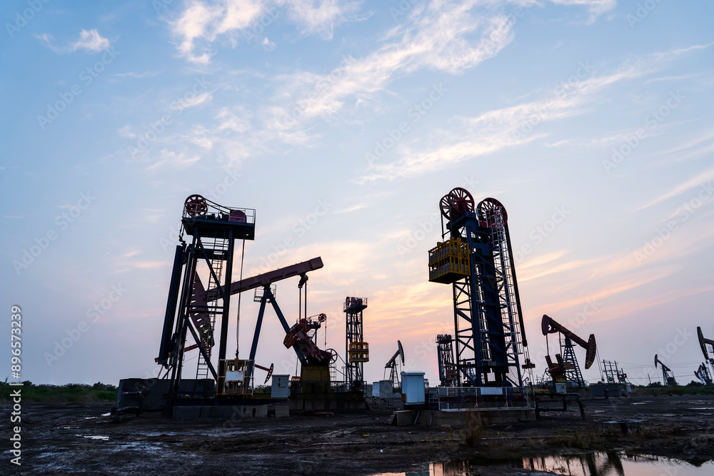 In the evening of oilfield derrick In the evening of oilfield derrick