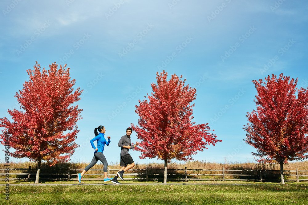 Couple, running and fitness with exercise, energy and cardio with break, wellness and bonding together. Healthy people, outdoor and man with woman, runner or speed with hobby, challenge or support Couple, running and fitness with exercise, energy and cardio with break, wellness and bonding together. Healthy people, outdoor and man with woman, runner or speed with hobby, challenge or support