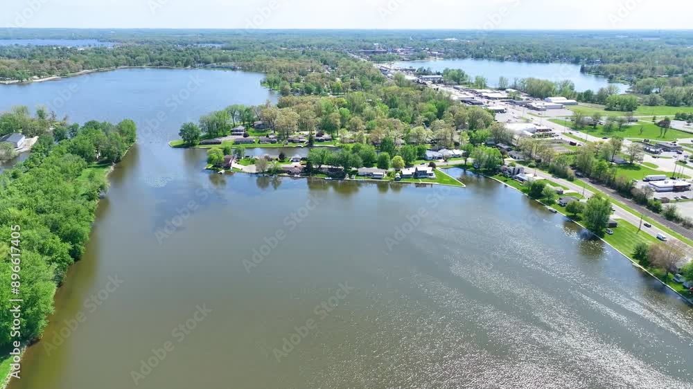 Aerial Fly Over Warsaw Indiana Lake Houses and Lush Greenery Aerial Fly Over Warsaw Indiana Lake Houses and Lush Greenery