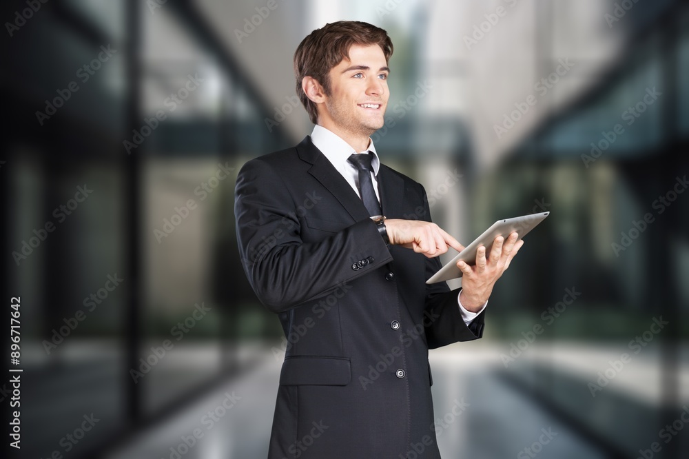 Happy smart businessman working in office Happy smart businessman working in office