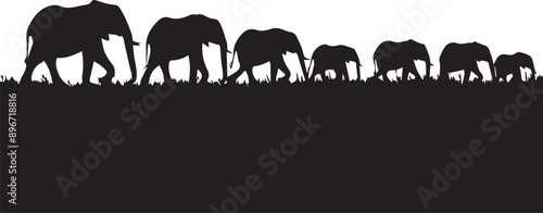 Silhouette of an elephant herd migrating across the plains