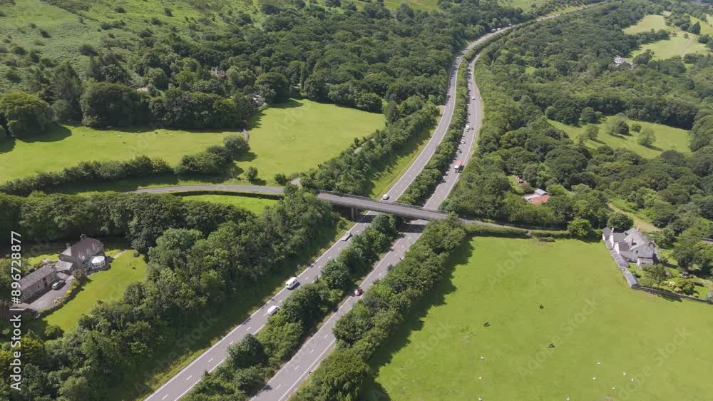 Aerial orbital view of the A30 road surrounded by Devon countryside, UK Aerial orbital view of the A30 road surrounded by Devon countryside, UK