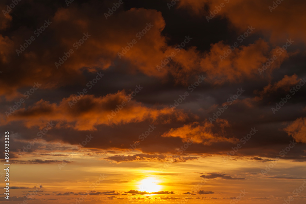 Dramatic sunset sky covered with colorful yellow clouds. Panoramic skyscape Dramatic sunset sky covered with colorful yellow clouds. Panoramic skyscape