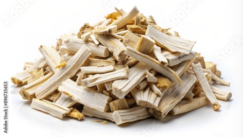 Freshly dried and sliced marshmallow root althaea officinalis in neat pile isolated on clean white studio background with soft focus.