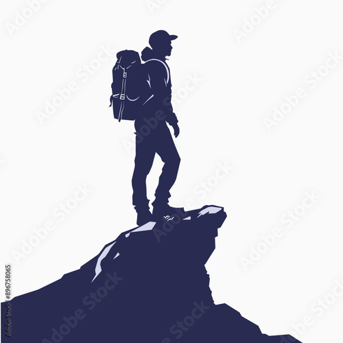 Silhouette of a hiker on a mountain peak.
