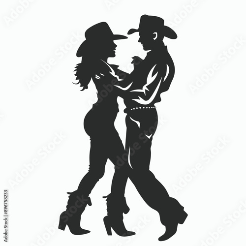 Silhouette of a cowboy couple dancing.  Romance and country.