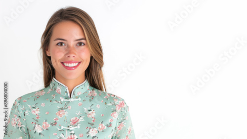 Canadian female smile in traditional cheongsam dress isolated on gray