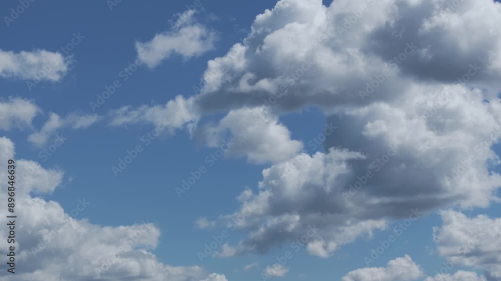 filming with a 70mm drone some beautiful Cumulus-type clouds on an afternoon with a blue sky and with a turn of the camera we discovered their peculiar shapes. The video is recorded in slow motion filming with a 70mm drone some beautiful Cumulus-type clouds on an afternoon with a blue sky and with a turn of the camera we discovered their peculiar shapes. The video is recorded in slow motion