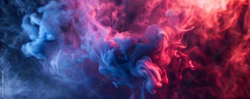Abstract colorful smoke swirl in various shades of blue and red on dark background, artistic concept Abstract colorful smoke swirl in various shades of blue and red on dark background, artistic concept