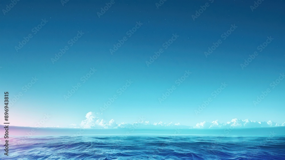 Fototapeta premium Calm blue ocean with fluffy clouds against a clear sky