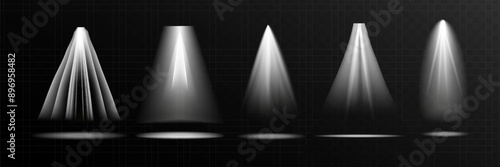 The spotlight shines on the stage. Llight from a lamp or spotlight. Lighted scene. Podium under the spotlight.