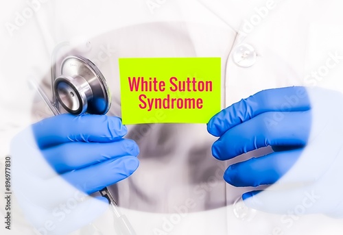 White Sutton syndrome medical term in a card on doctor hand, neurodevelopmental disorder. photo