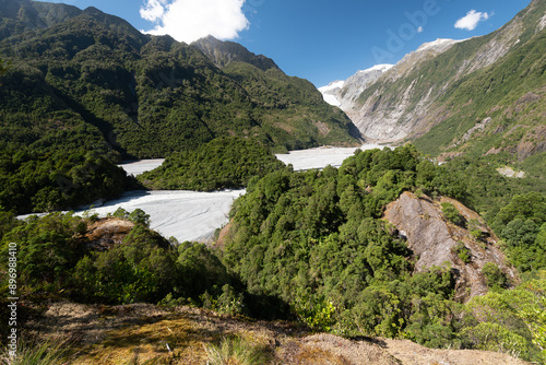 Elevated view from Sentinel Rock looking up the Waiho River valley to the Franz Josef glacier in the Southern Alps, West Coast, South Island, New Zealand.