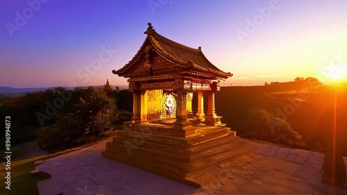 Wallpaper Mural The orange glow of the setting sun casts a warm embrace over the stone shrine giving it a sense of ethereal beauty. Torontodigital.ca
