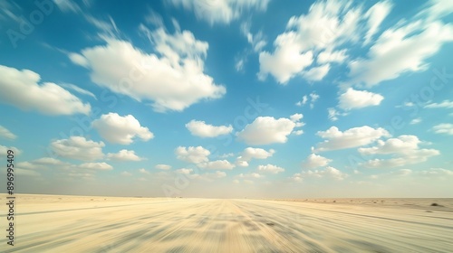 Desert Road Under a Vast Blue Sky