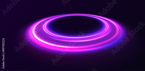 Neon lights and circles move quickly against a dark background. Curve light effect of blue line. Luminous blue circle.	