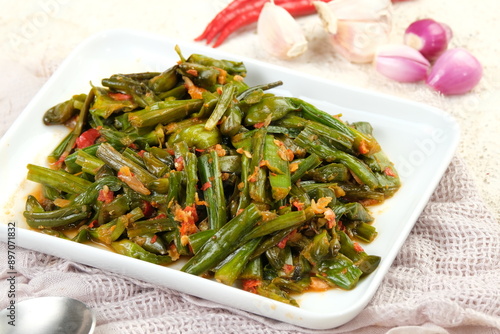 tumis genjer or oseng genjer is Indonesian traditional food.	 photo