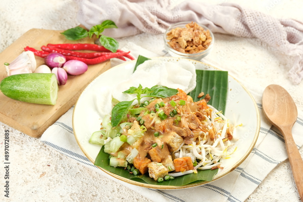 Nasi Lengko or Sega Lengko or Lengko Rice is a traditional vegetarian food from Cirebon, Indonesia Nasi Lengko or Sega Lengko or Lengko Rice is a traditional vegetarian food from Cirebon, Indonesia