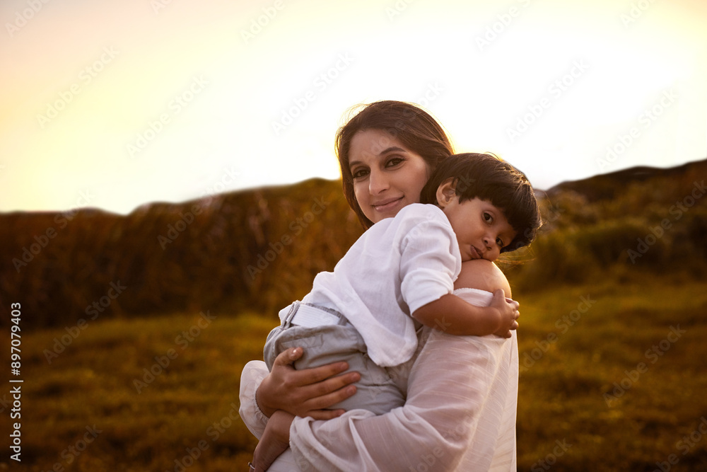 Mother, son and outdoor hug in portrait, countryside vacation and security in relationship. Mama, boy and embrace in nature on holiday for support, love and affection for child or field bonding Mother, son and outdoor hug in portrait, countryside vacation and security in relationship. Mama, boy and embrace in nature on holiday for support, love and affection for child or field bonding