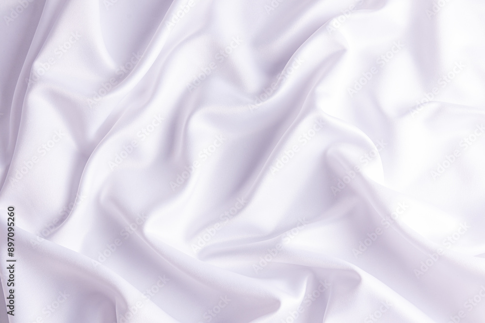 Naklejka premium Chic white wedding background in white satin with soft pleats. delicate folds of fabric. A copy of the space. design. layout. template.