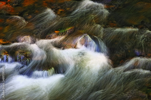 Turbulent Waters Of A Mountain Stream Flowing Over Rocks