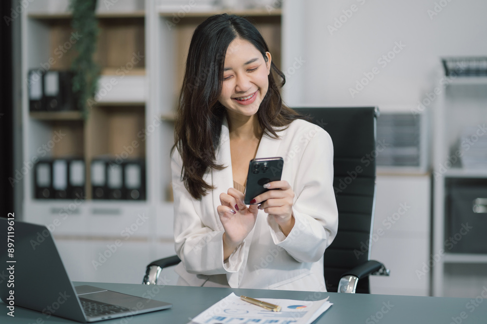 Businessman using laptop computer in office. Happy woman, entrepreneur, small business owner working online. Businessman using laptop computer in office. Happy woman, entrepreneur, small business owner working online.