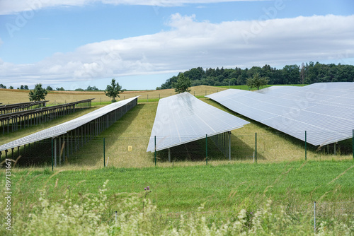 Solar panels in a field for industrial use of electricity.