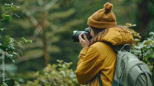 Wallpaper Mural A young woman capturing nature photos with a DSLR camera, representing photography as a hobby Torontodigital.ca