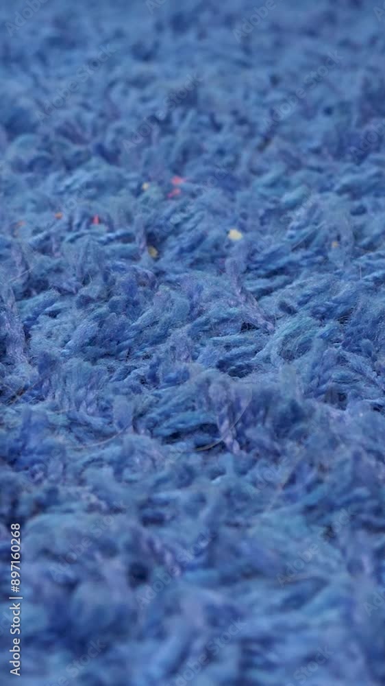 Household and cleaning concept. Hoovering blue carpet at home. Vacuum cleaner in house Household and cleaning concept. Hoovering blue carpet at home. Vacuum cleaner in house